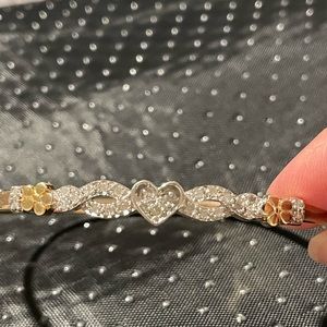 10K Gold bangle with tiny diamonds.